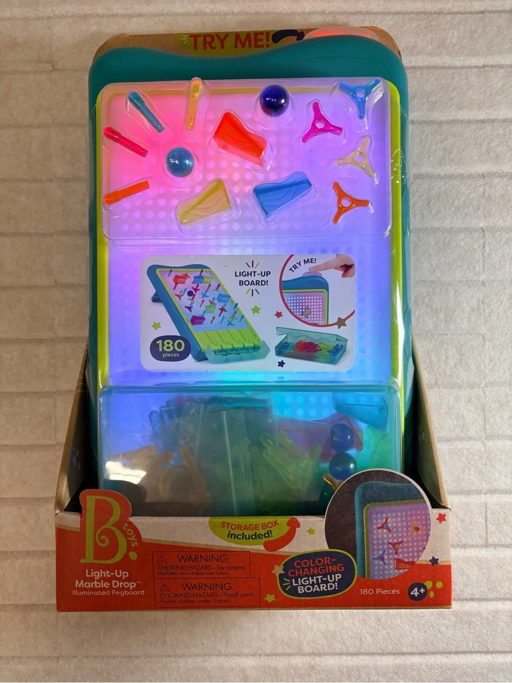 Light-Up Marble Drop Pegboard Toy - Teal Frame with Multicolor Pegs